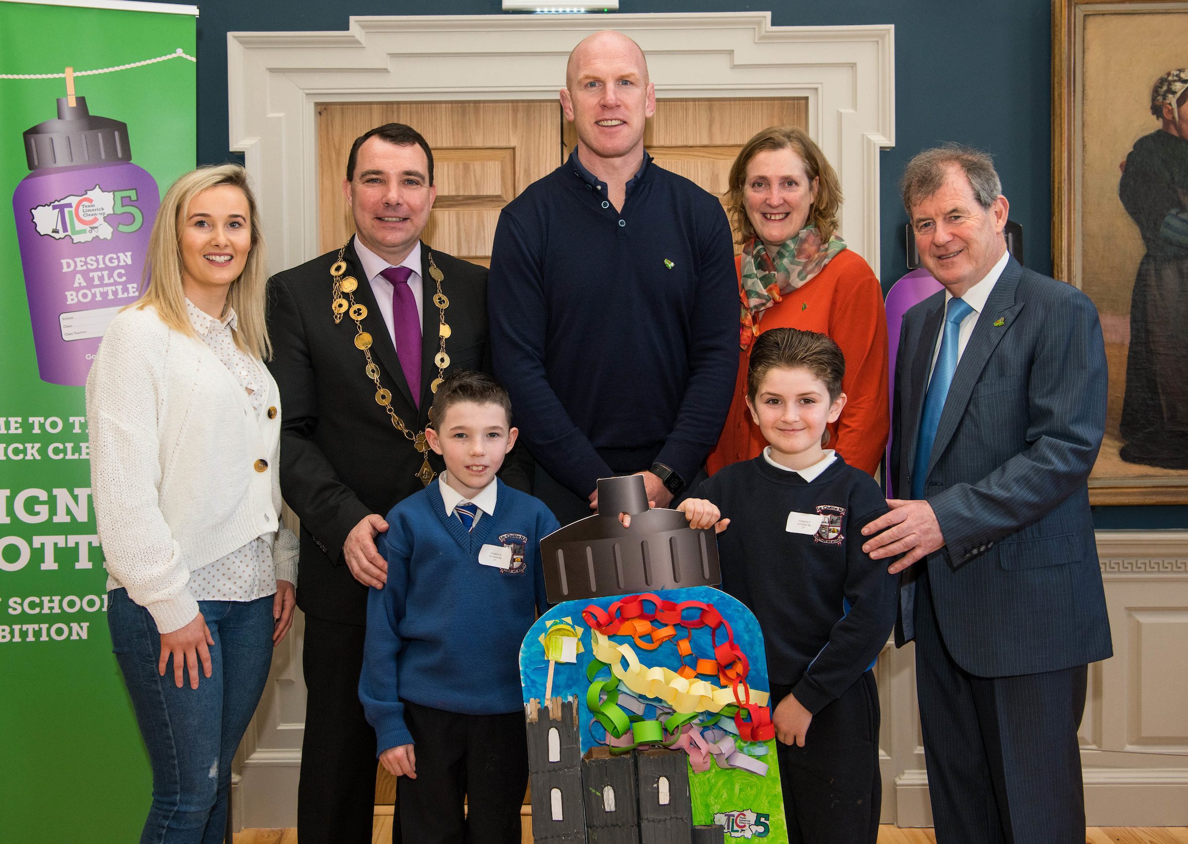 07/03/20192nd place winners of the 3rd and 4th class category are students Travis Wong McNamara, left, and Anthony Casey, from Le Chéile N.S,Roxboro Road, along with teacher Emily Maher, Mayor of Limerick City and County, Cllr James Collins, Paul O'Connell, Helen O'Riordan and JP McManus at the 'Design a TLC Bottle' prizegiving at the Hunt Museum, Limerick. Over 50 primary schools across the county entered ahead of Team Limerick Clean-Up 5, which will see thousands of volunteers take to the streets of Limerick city and county for Europe's largest one-day clean up. Sponsored by the JP McManus Benevolent Fund, the event has seen over 360 tonnes of litter gathered from the streets since inception in 2015. Over 14,000 volunteers have already signed up for the 2019 event, taking place on Good Friday, 19th April. Photo by Diarmuid Greene
